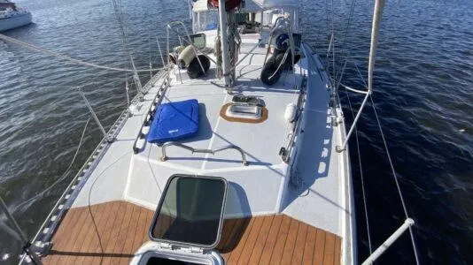 Slide: The Image of Sailboat deck view of 1990 Bruce Roberts 43 Mauritius on water. - 24