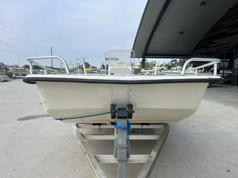 Slide: The Image of 2007 Carolina Skiff 198 DLX boat on trailer, front view, outdoor setting. - 4