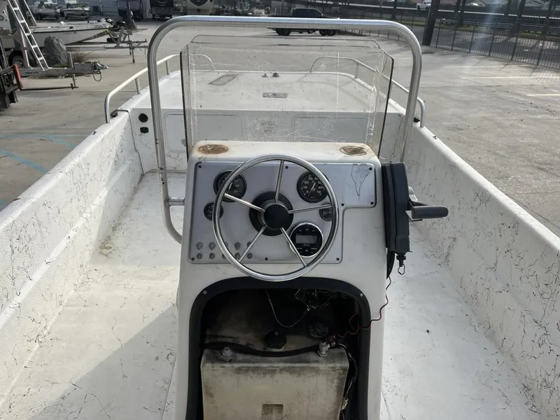 Slide: The Image of 2007 Carolina Skiff 198 DLX boat interior with steering console and gauges. - 7