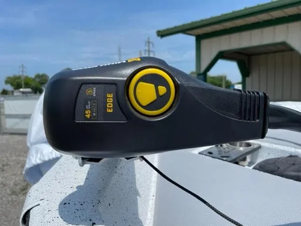 Slide: The Image of Close-up of a 2023 Xpress H17 boat control lever with yellow accents. - 4