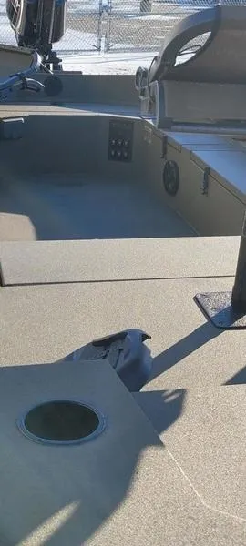 Slide: The Image of 2023 Thor Lake Hammer 1754 Elite boat interior with seating and control panel. - 5