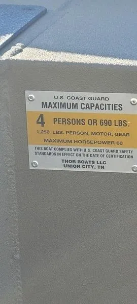 Slide: The Image of 2023 Thor Lake Hammer 1754 boat capacity label: 4 persons or 690 lbs, max horsepower 60. - 6