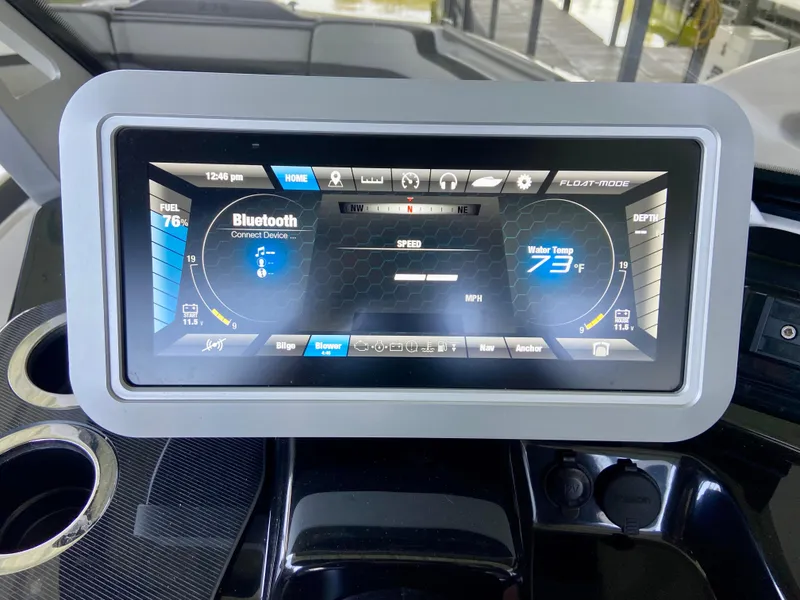 Slide: The Image of Dashboard display of 2019 Yamaha Boats 275 SE showing speed, fuel, and water temperature. - 40