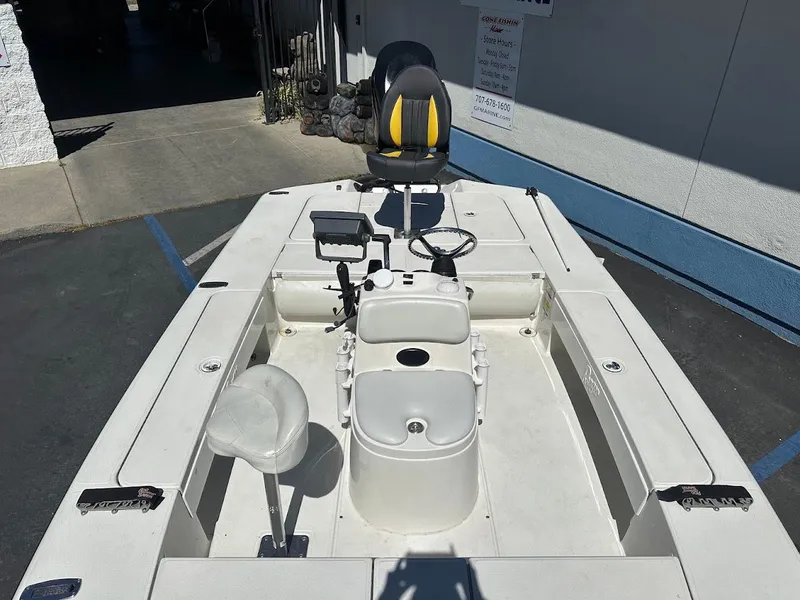 Slide: The Image of 2007 Ranger 191 Cayman boat interior with steering wheel and seating. - 22