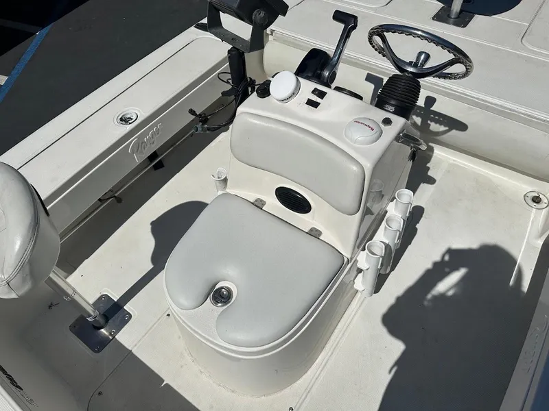 Slide: The Image of 2007 Ranger 191 Cayman boat interior with steering wheel and controls. - 23