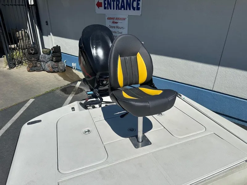 Slide: The Image of 2007 Ranger 191 Cayman boat with swivel seat and outboard motor. - 28