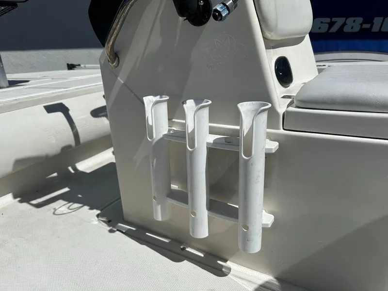 Slide: The Image of Rod holders on a 2007 Ranger 191 Cayman boat, white interior detail. - 34