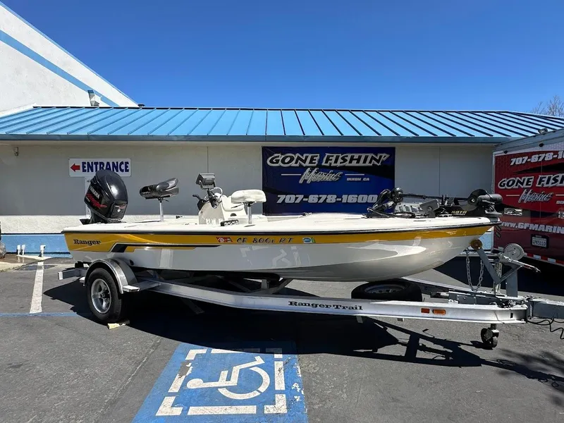 Slide: The Image of 2007 Ranger 191 Cayman boat on trailer outside Gone Fishin' Marine store. - 4