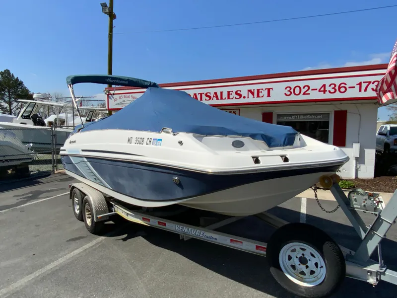 Slide: The Image of 2016 Hurricane Center Console 19 OB boat on trailer at dealership. - 20