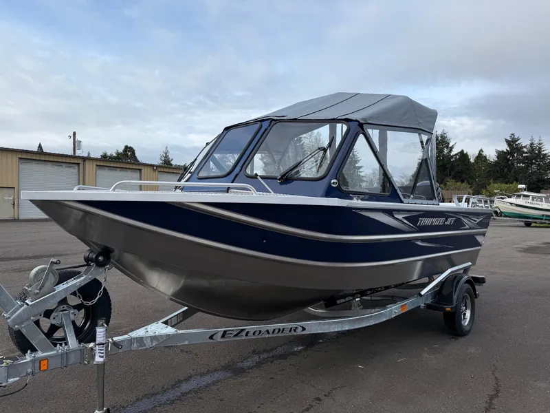 Slide: The Image of 2025 Thunder Jet 185 Luxor boat on trailer, parked outdoors. - 6