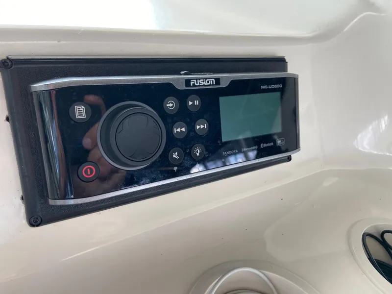Slide: The Image of Fusion marine stereo system on 1997 Sea Ray 450 Sundancer yacht dashboard. - 11