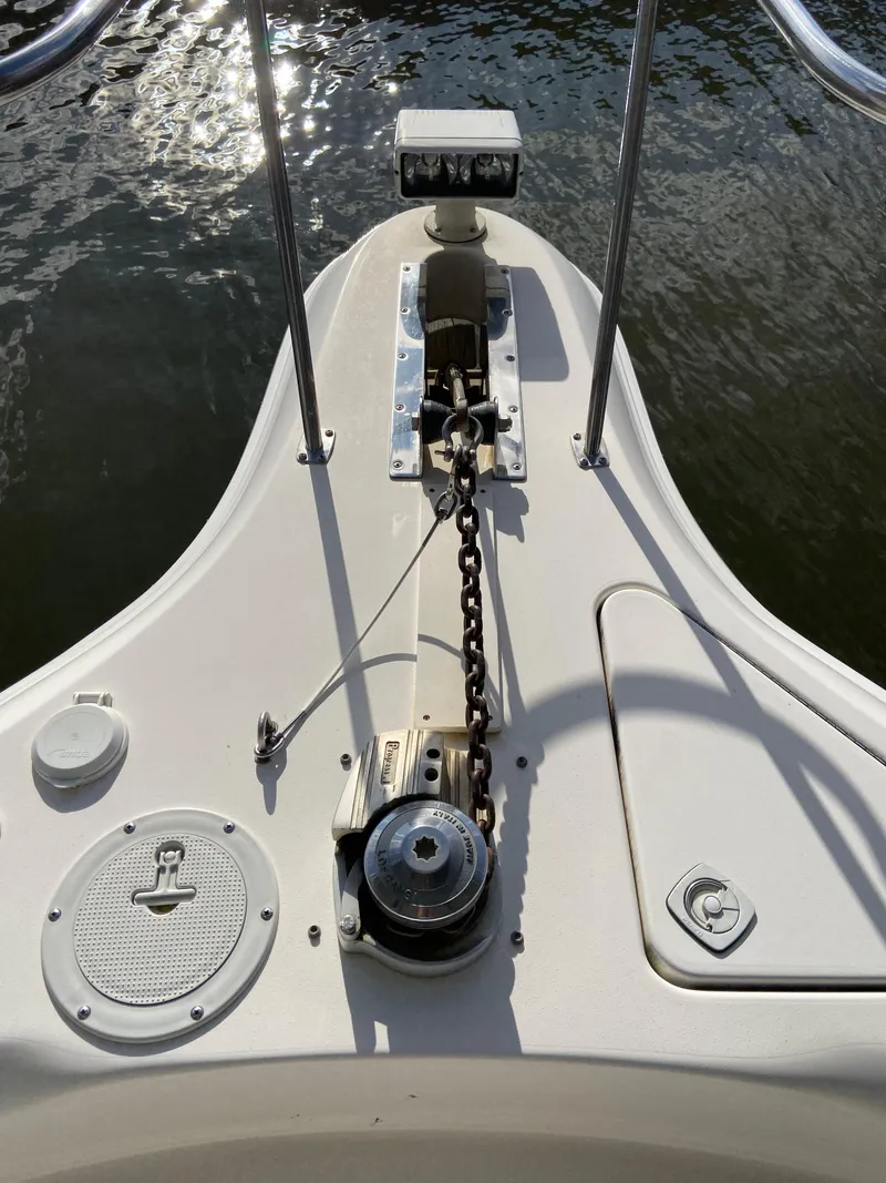 Slide: The Image of Bow of 1997 Sea Ray 450 Sundancer with anchor chain and winch system. - 2