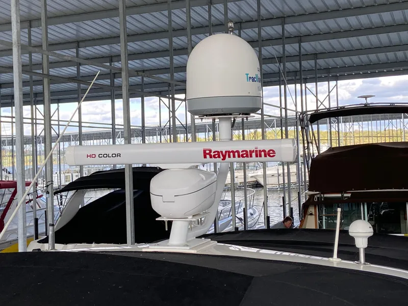 Slide: The Image of Radar equipment on a 1997 Sea Ray 450 Sundancer yacht in a marina. - 3