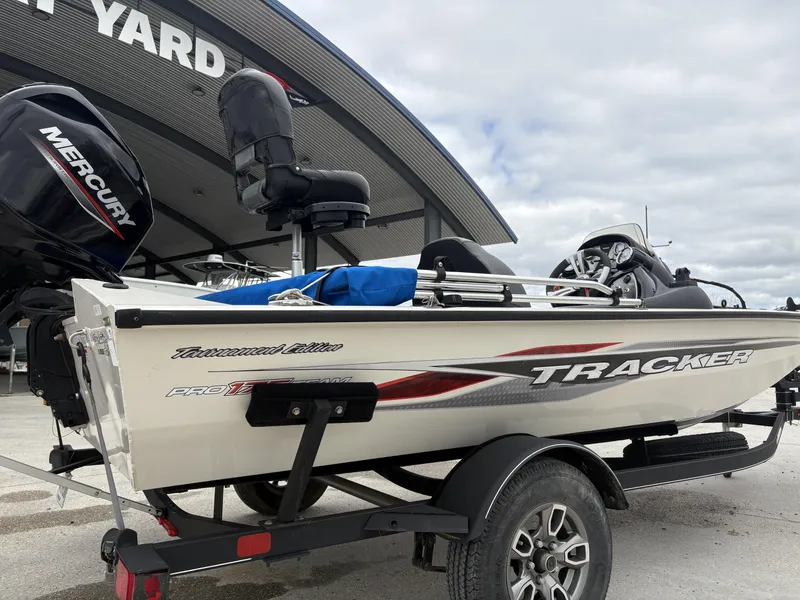 Slide: The Image of 2021 Tracker Pro Team 175 Tournament boat with Mercury engine at a boatyard. - 6