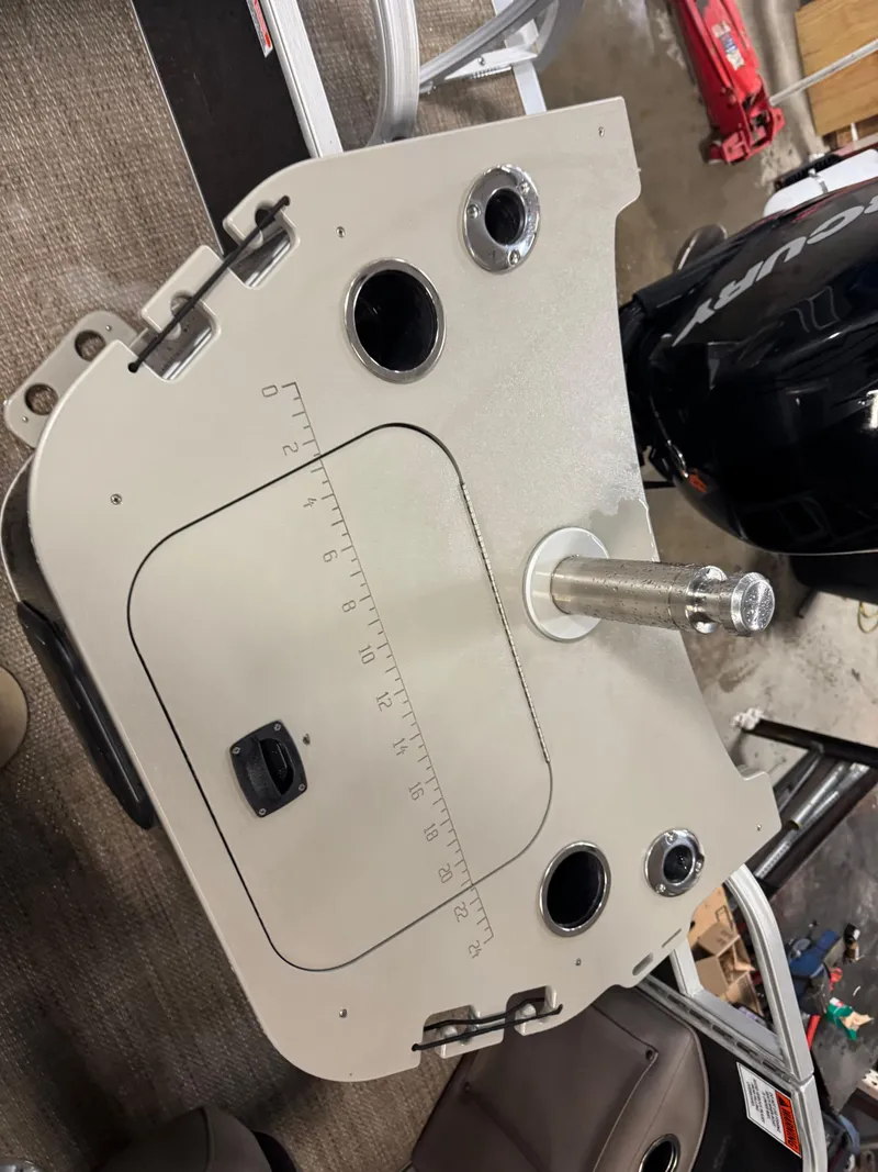 Slide: The Image of 2018 Bennington 25 SSXAPG boat dashboard with gauges and controls. - 10