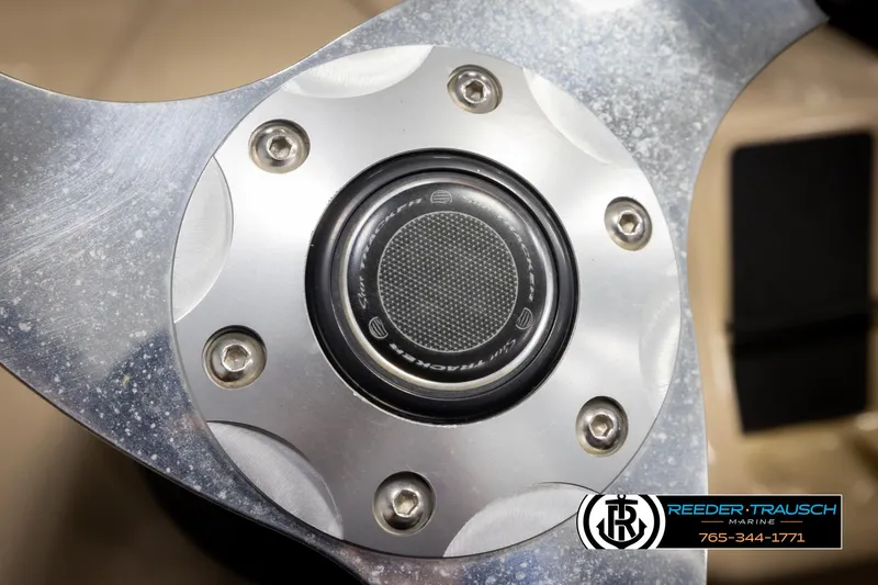 Slide: The Image of Close-up of a 2016 Sun Tracker 24 Party Barge propeller with Reeder-Trausch Marine logo. - 26