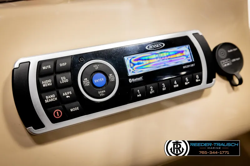 Slide: The Image of 2016 Sun Tracker 24 Party Barge stereo system with Jensen control panel and Bluetooth connectivity. - 27