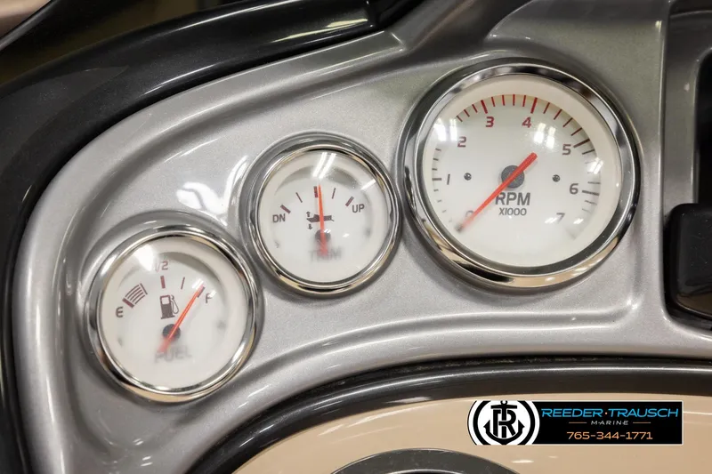 Slide: The Image of Dashboard gauges of a 2016 Sun Tracker 24 Party Barge boat. - 28