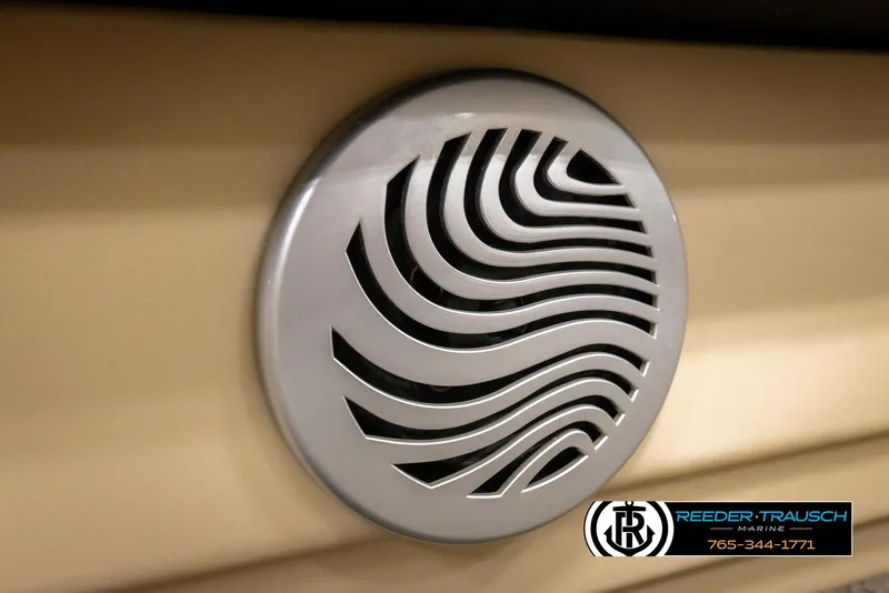Slide: The Image of Speaker grille on 2016 Sun Tracker 24 Party Barge, featuring wavy design. - 38