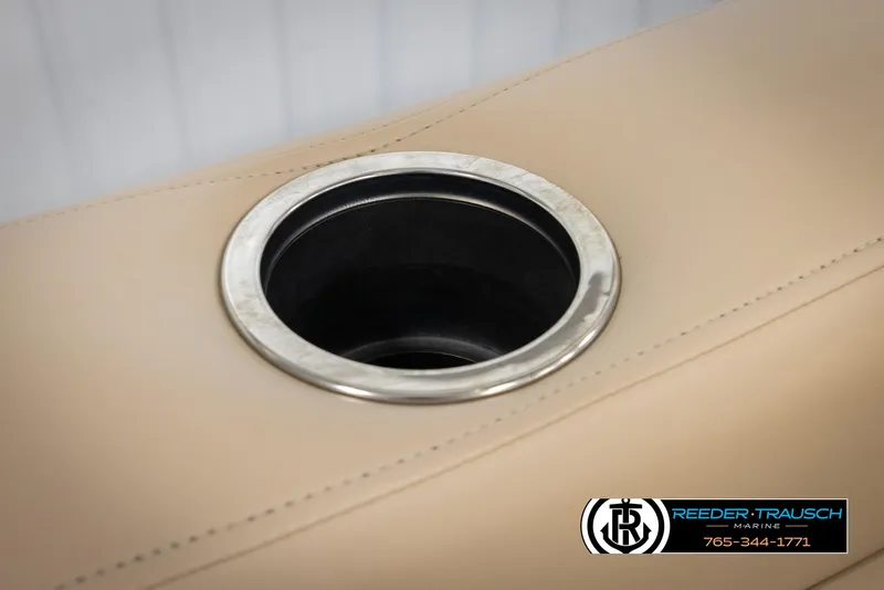 Slide: The Image of Cup holder on 2016 Sun Tracker 24 Party Barge boat, beige upholstery. - 41