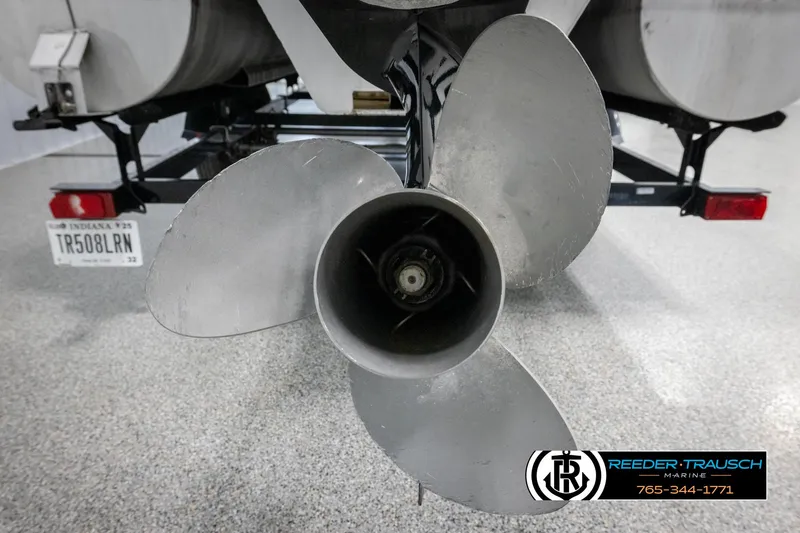 Slide: The Image of 2016 Sun Tracker 24 Party Barge propeller and trailer, close-up view. - 44