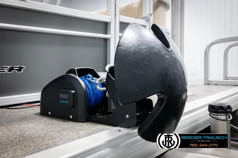 Slide: The Image of 2016 Sun Tracker 24 Party Barge with anchor winch and blue rope on deck. - 45