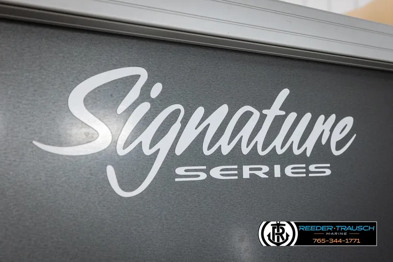 Slide: The Image of 2016 Sun Tracker 24 Party Barge Signature Series logo with Reeder-Trausch Marine branding. - 46