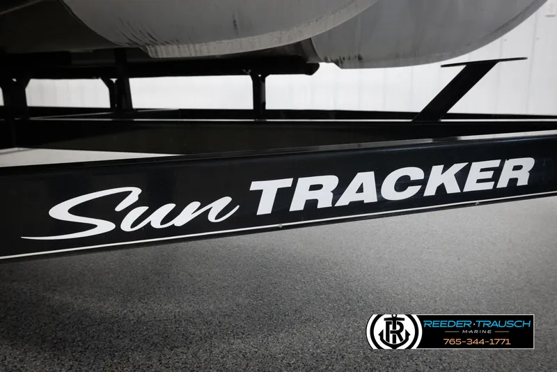 Slide: The Image of 2016 Sun Tracker 24 Party Barge trailer with logo, displayed at Reeder-Trausch Marine. - 49