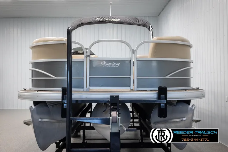 Slide: The Image of 2016 Sun Tracker 24 Party Barge pontoon boat in showroom, rear view. - 8