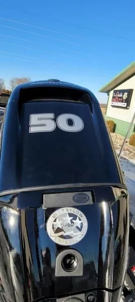 Slide: The Image of 2023 Thor Lake Hammer 1754 Deluxe outboard motor with "50" decal, outdoor setting. - 7