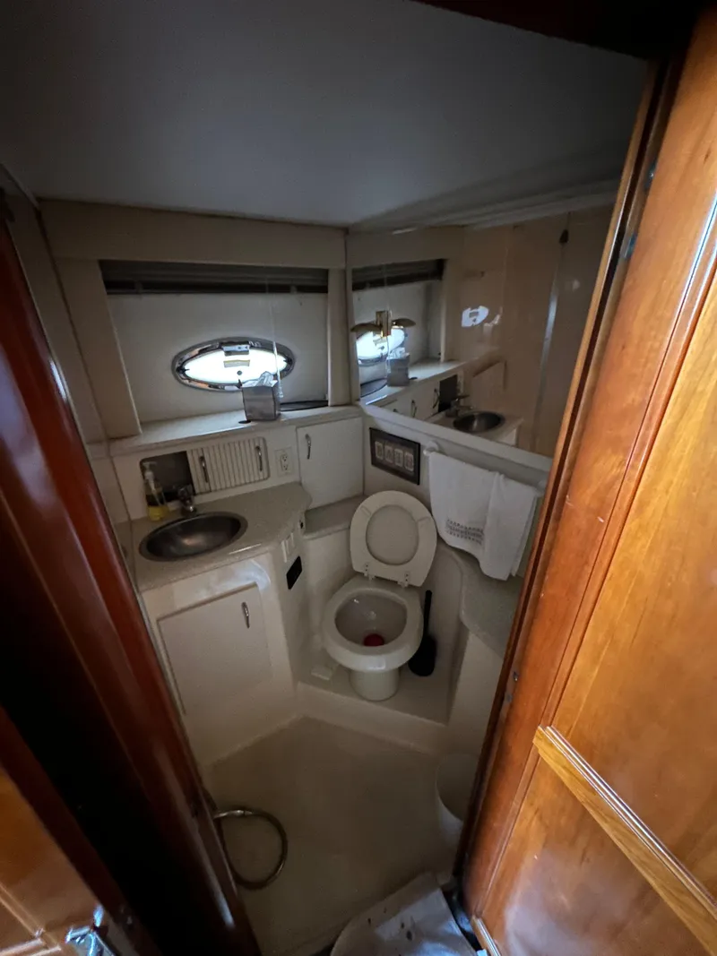 Slide: The Image of Bathroom interior of 2003 Carver 356 Motor Yacht with sink and toilet. - 19