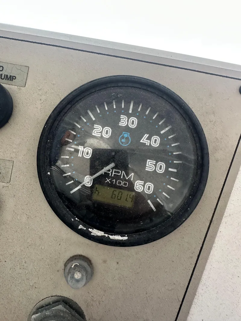 Slide: The Image of Close-up of a 2003 Carver 356 Motor Yacht RPM gauge displaying engine speed. - 32