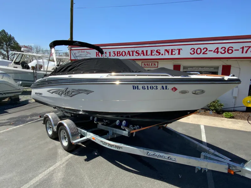 Slide: The Image of 2017 Monterey 217 Outboard boat on trailer at dealership, ready for sale. - 22