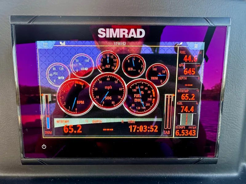 Slide: The Image of Simrad display showing engine metrics on 2019 Coach Pontoons 230 RF. - 16