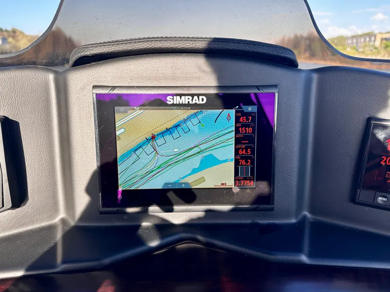 Slide: The Image of Simrad navigation display on 2019 Coach Pontoons 230 RF boat dashboard. - 17