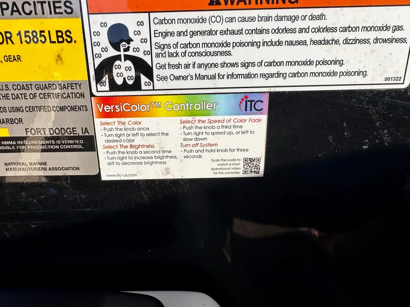 Slide: The Image of Warning labels and VersiColor Controller instructions on 2019 Coach Pontoons 230 RF. - 21