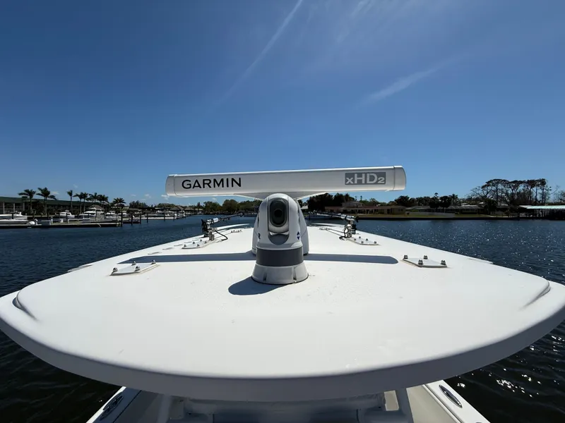 Slide: The Image of 2022 Invincible 33 Catamaran with Garmin radar on calm water. - 18