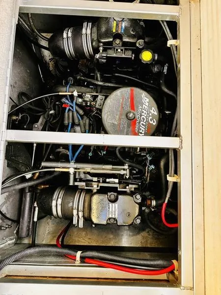 Slide: The Image of Engine compartment of a 2006 Sun Tracker PARTY BARGE with Mercury 4.3 motor. - 10