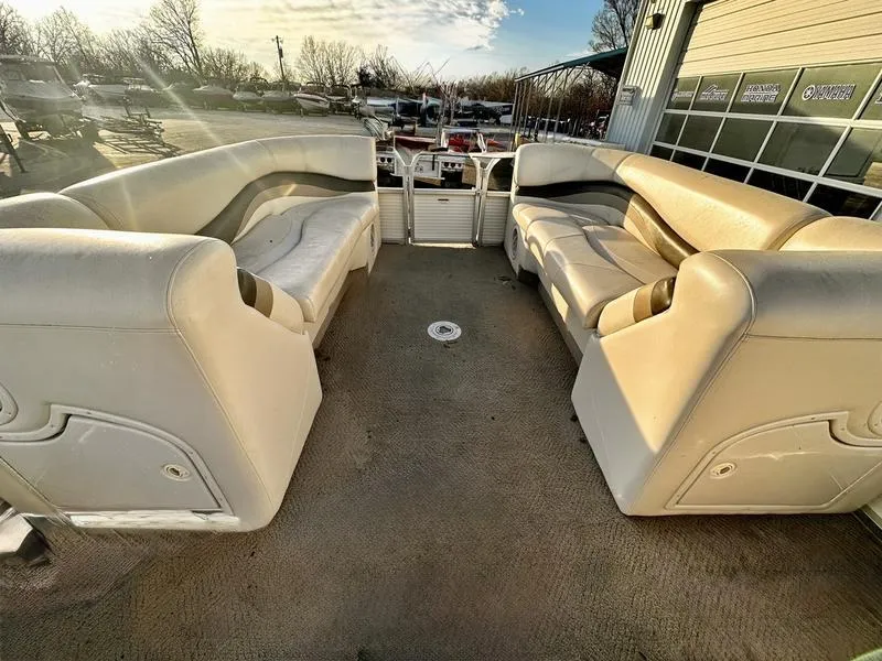 Slide: The Image of 2006 Sun Tracker PARTY BARGE interior with spacious seating and open deck. - 17