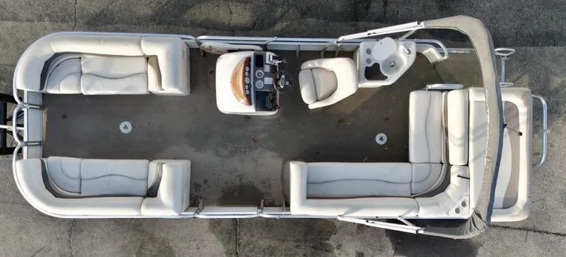 Slide: The Image of 2006 Sun Tracker PARTY BARGE pontoon boat, aerial view, spacious seating, and helm station. - 7