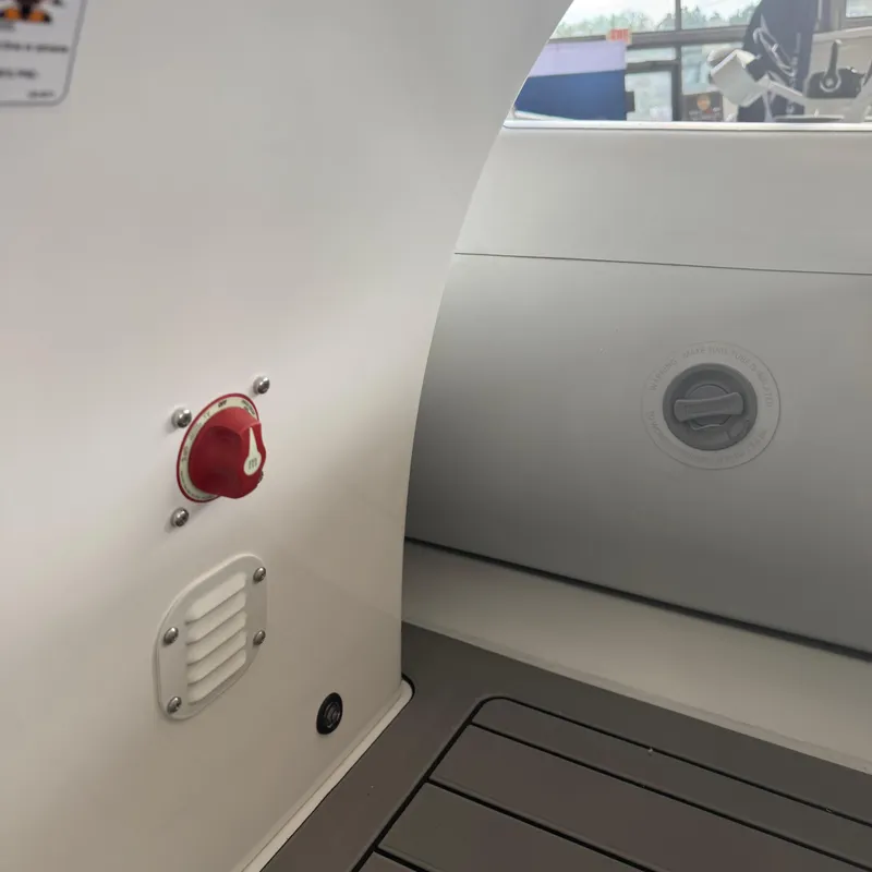 Slide: The Image of 2025 Highfield Sport 390 boat interior with cushioned seating and modern design. - 13