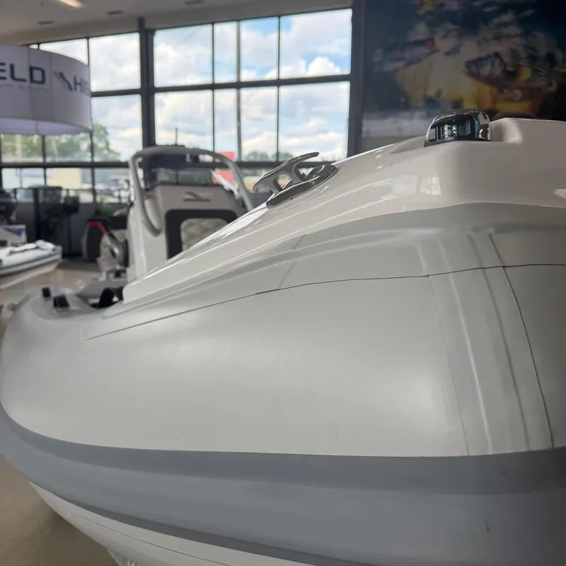 Slide: The Image of Close-up of 2025 Highfield Sport 390 boat handle and seating detail. - 4