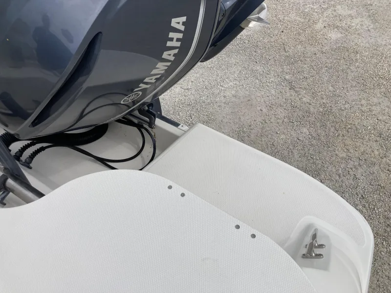 Slide: The Image of 2014 Wellcraft 232 Coastal boat with Yamaha outboard motor, rear deck view. - 21