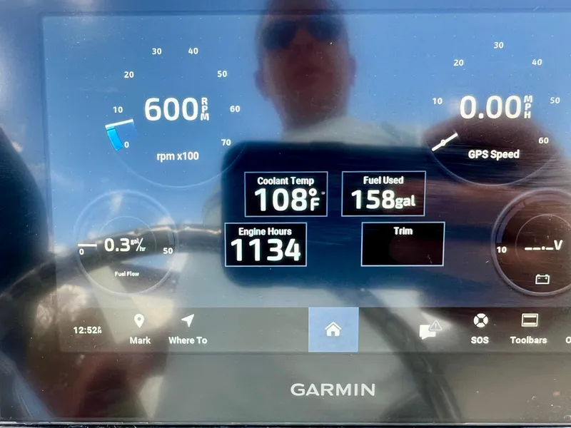 Slide: The Image of Garmin display on Centurion Parasail Boat, showing 600 RPM, 108°F coolant, 158 gallons fuel used. - 12
