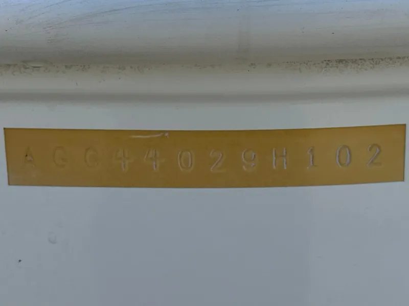 Slide: The Image of Hull identification number on a 2002 Baja 24H2X boat. - 28