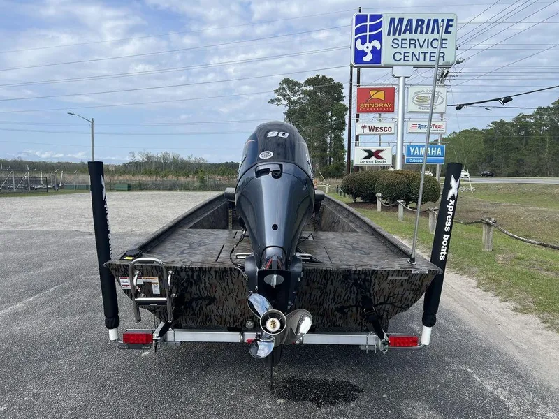 Slide: The Image of 2025 Xpress XP18CC boat at Marine Service Center with 90HP engine. - 8