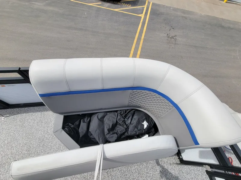 Slide: The Image of Angler Qwest 2285 FISH N CRUISE 2023 boat seating with storage compartment. - 18