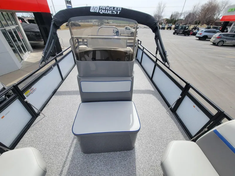Slide: The Image of 2023 Angler Qwest 2285 Fish N Cruise pontoon boat interior at dealership. - 20