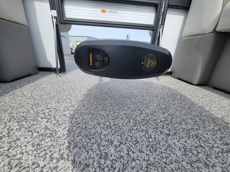 Slide: The Image of 2023 Angler Qwest 2285 Fish N Cruise boat interior with Minn Kota Terrova trolling motor. - 33