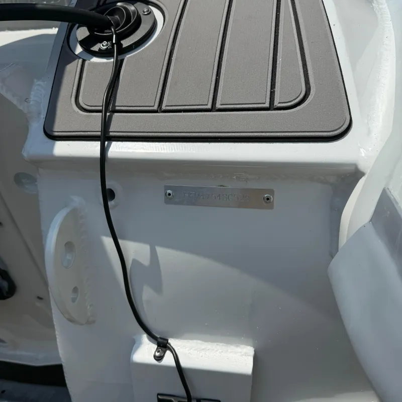 Slide: The Image of 2025 Highfield Sport 420 boat detail with cable and identification plate. - 11